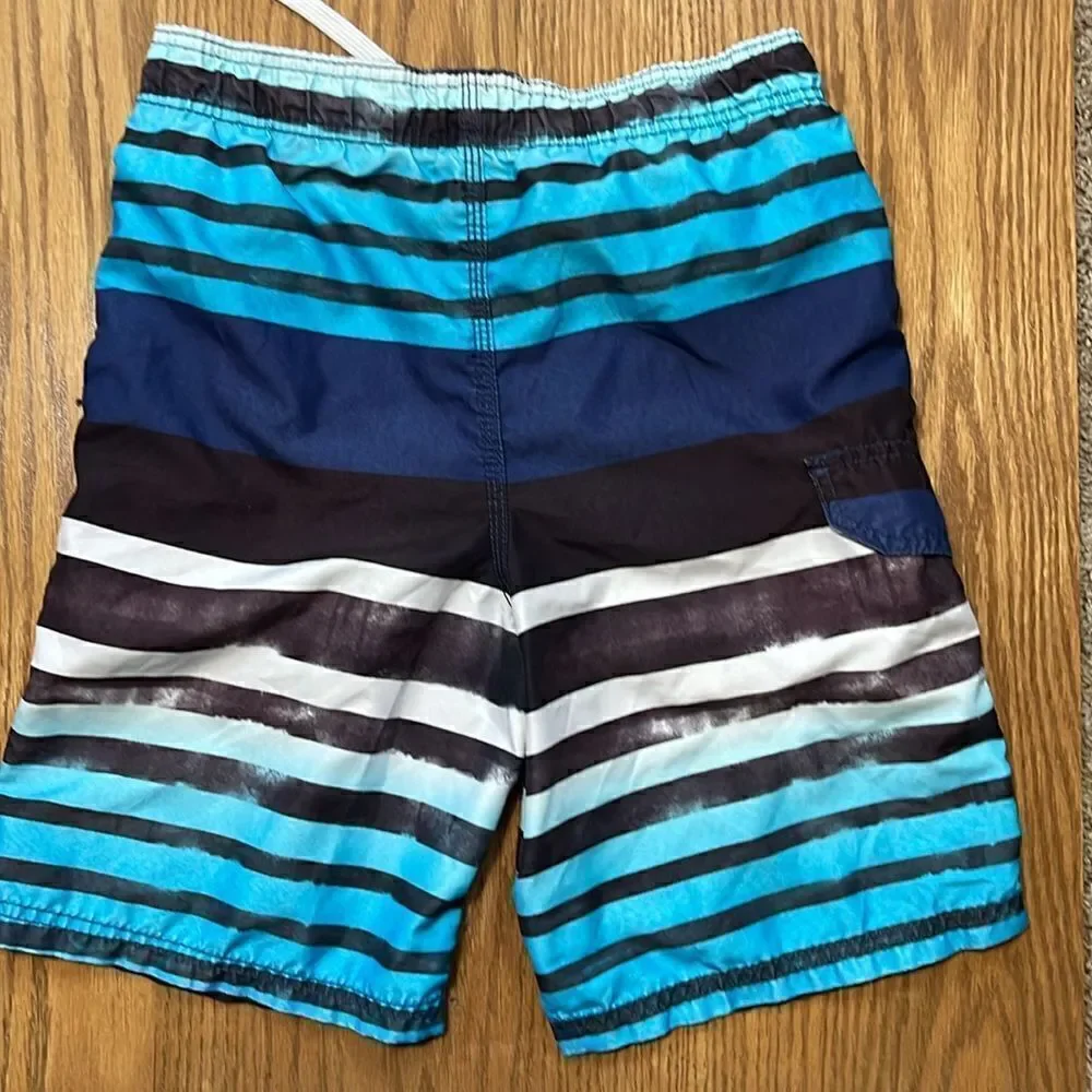 Kanu surf swimming shorts. Drawstring waist. Size medium. Size 10/12. Pocket.